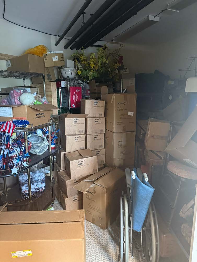 Room crowded with stored boxes