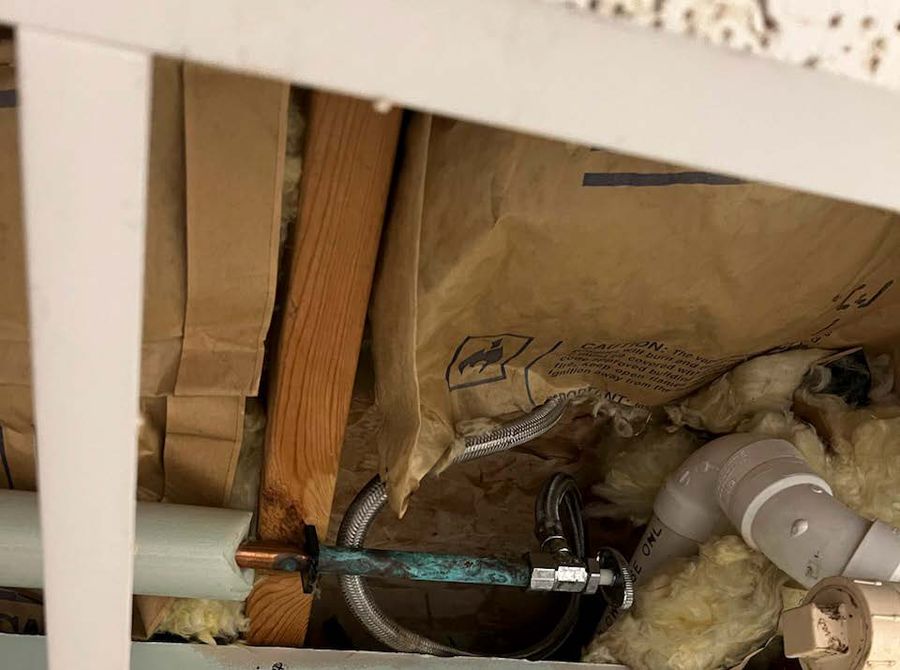 Aging plumbing behind a wall